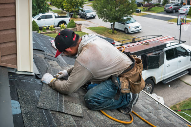 Professional Roofing technician working in East Sandwich, MA